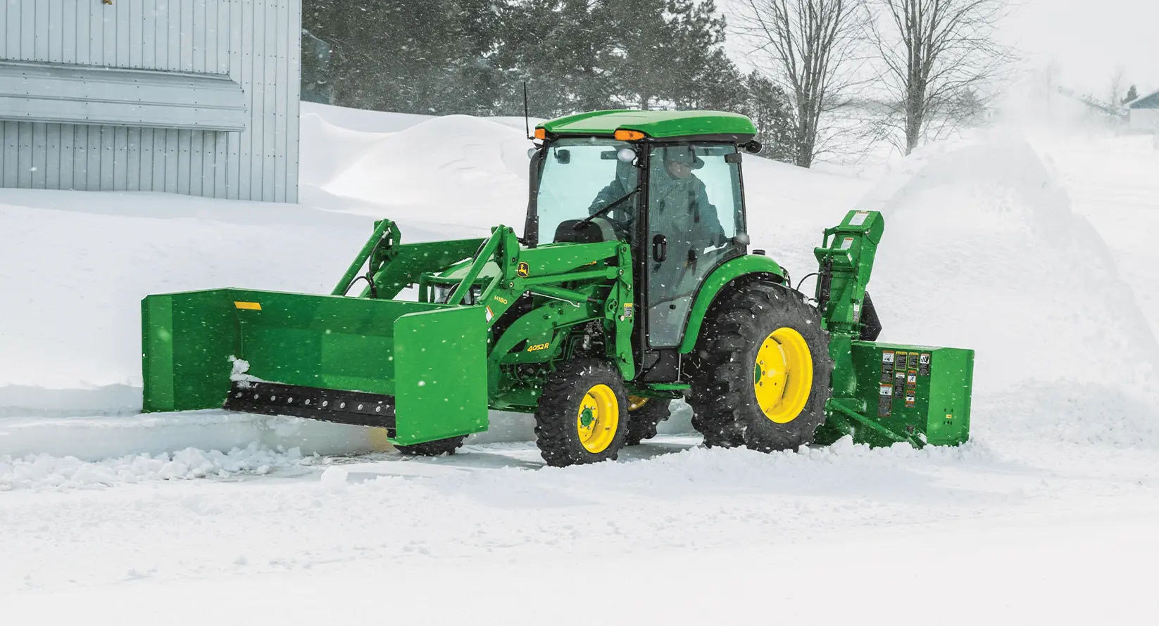 John Deere Tractor in the snow