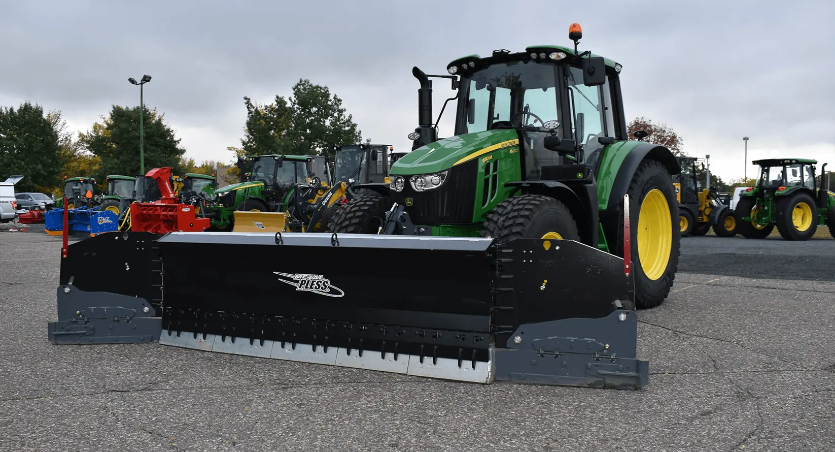 John Deere with Metal Pless Snow Pusher