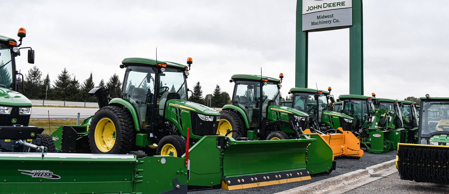 John Deere Tractors with Snow Removal Attactments