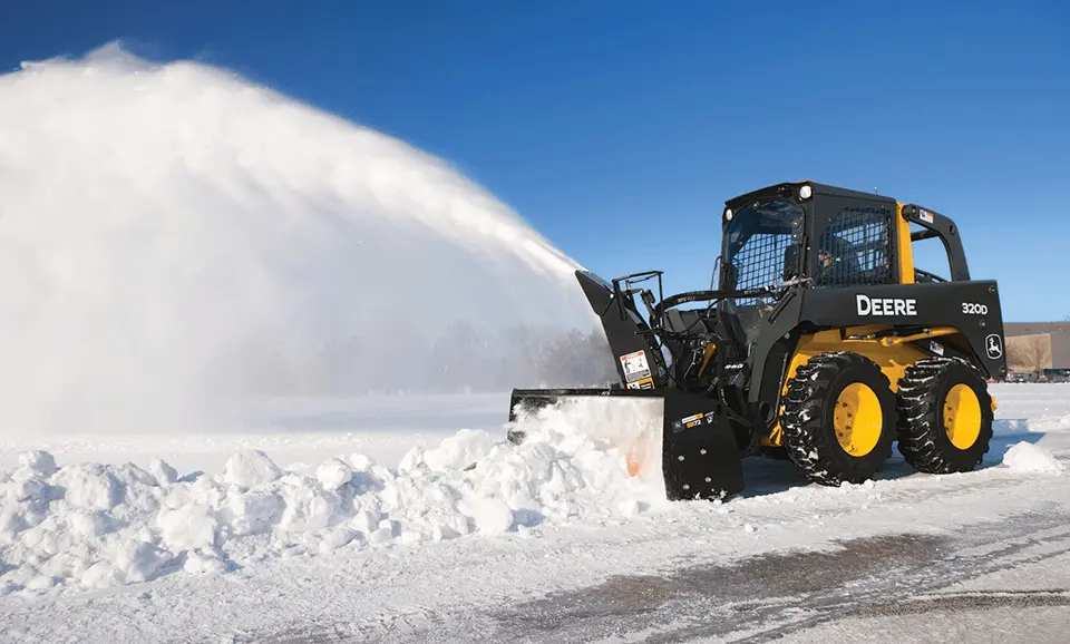 John Deere Skid Steer in snow